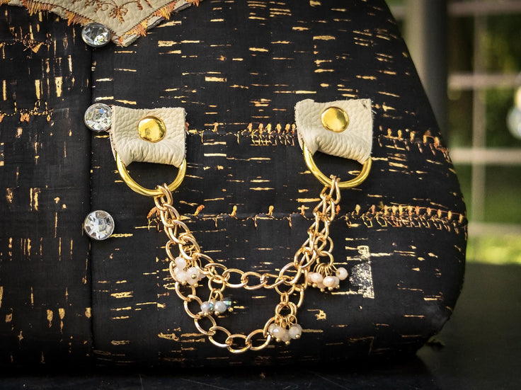 The Gilded Eclipse-Handmade cork and natural leather, and top handle bag with gold chain.