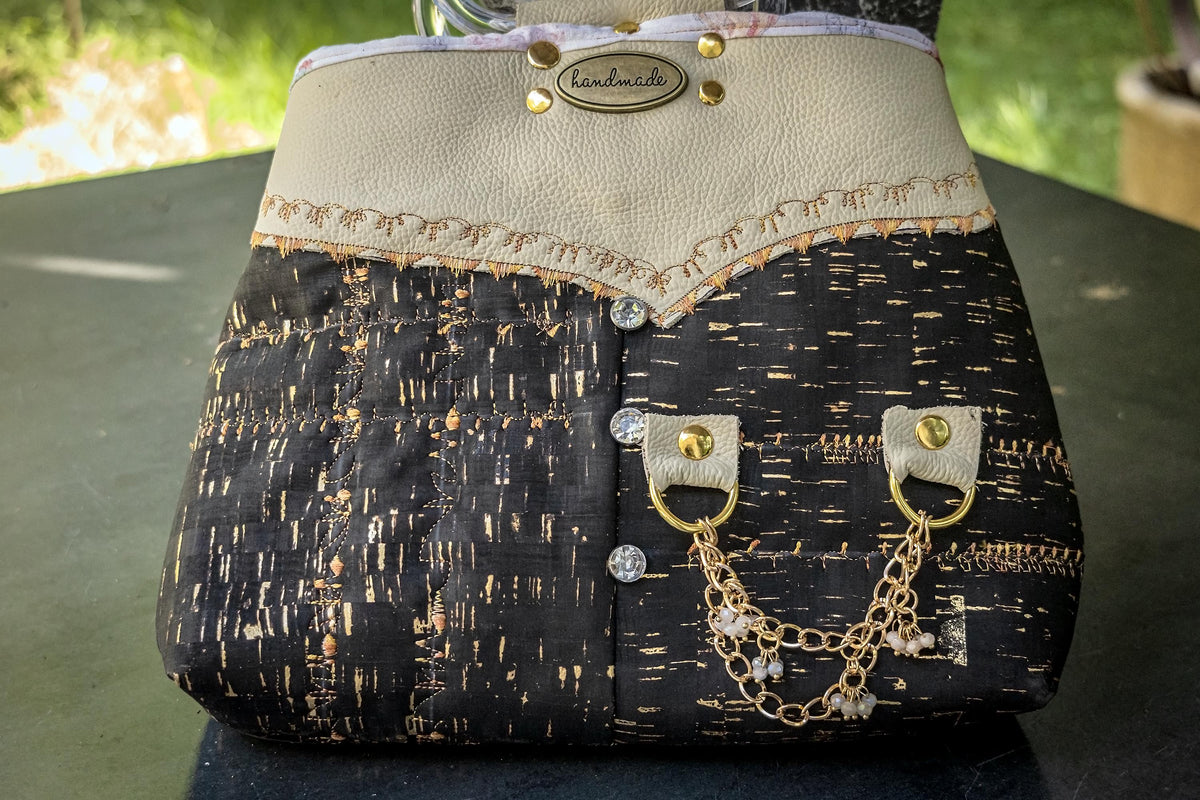 The Gilded Eclipse-Handmade cork and natural leather, and top handle bag with gold chain.